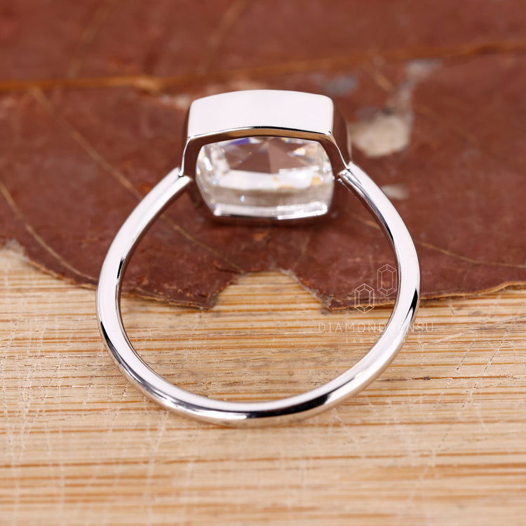 Customise ring with bezel set diamond ring.