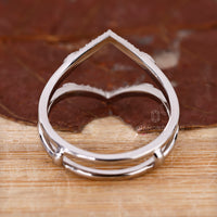 Prong Setting Band with wrap guard and leaf-inspired style.