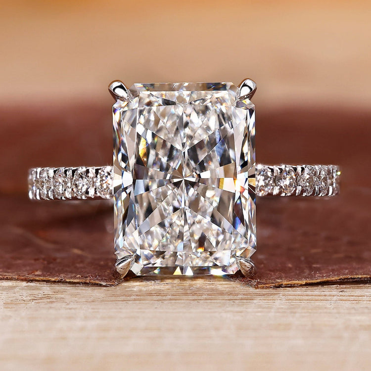 Radiant cut engagement ring with pave setting.