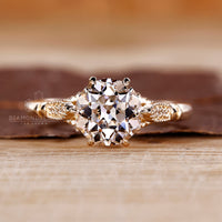 Vintage Engagement Ring with old European cut diamond in yellow gold.