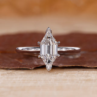 Elongated Hexagon Step Cut ring with solitaire engagement ring.