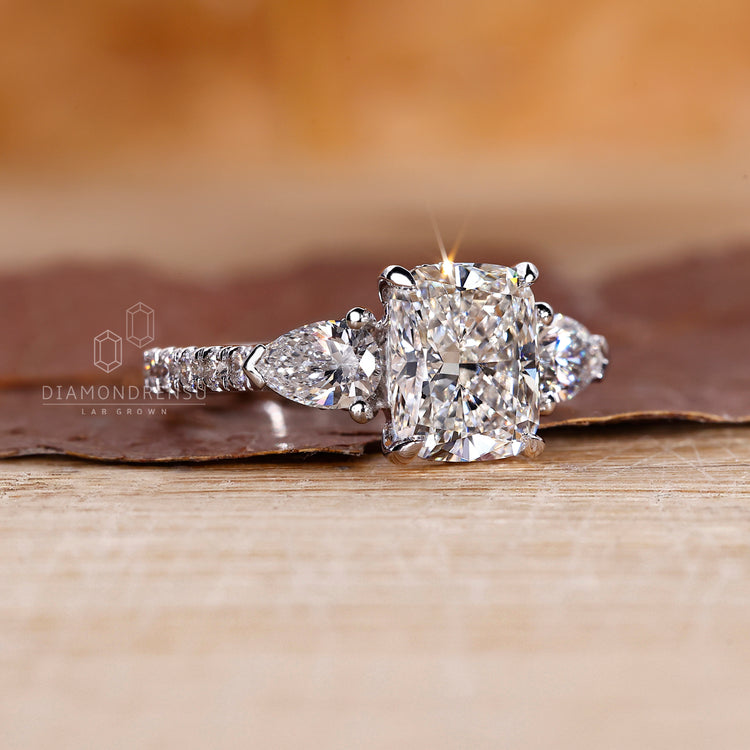 White gold engagement ring has pave setting ring.