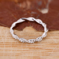 Infinity twist diamond ring for her.