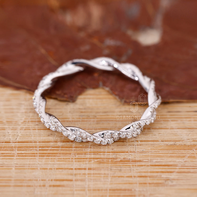 Infinity twist diamond ring for her.