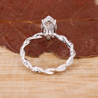 Lab grown diamond ring with claw prong setting.