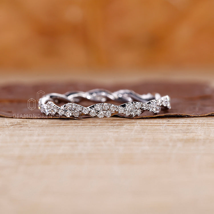 Dainty full eternity band with lab diamonds.