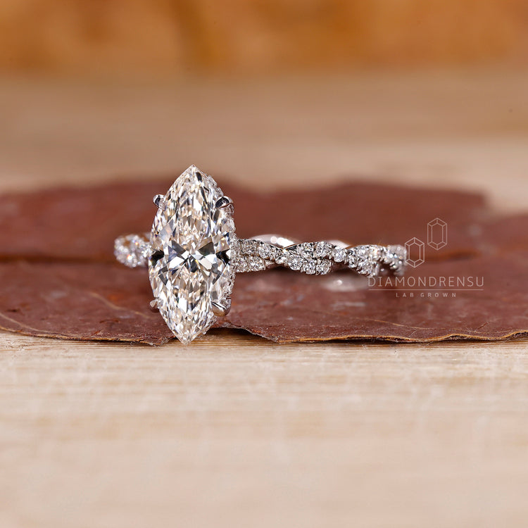 Twisted pavé marquise ring crafted in white gold.