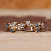 Nature Inspired Wedding Band with marquise and round diamonds.