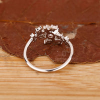 White gold cluster diamond engagement ring.