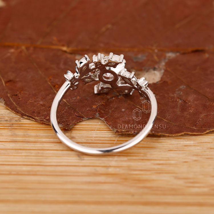White gold cluster diamond engagement ring.