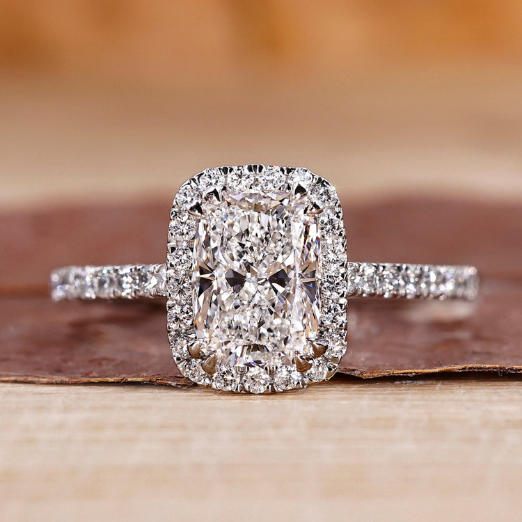 Elongated cushion cut diamond ring in white gold ring.