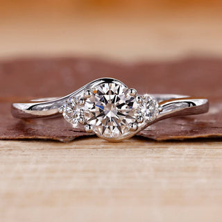 Three stone diamond engagement ring in white gold ring.