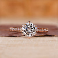 Rose gold diamond ring with round cut diamond ring.