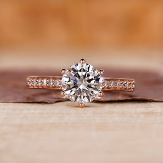 Rose gold diamond ring with round cut diamond ring.