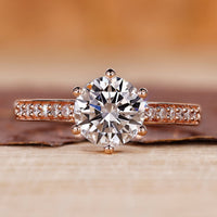 Rose gold diamond ring with round cut diamond ring.