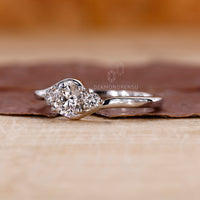 But engagement ring featuring round diamond ring.