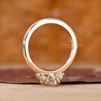 Solitaire engagement ring with marquise diamond in 8 claw prong.