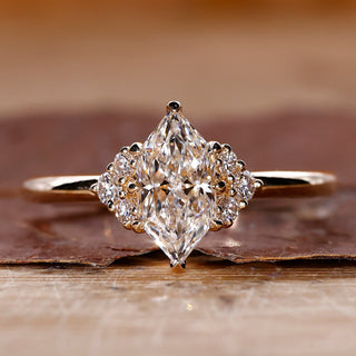 Dutch marquise solitaire diamond ring with 8 claw prong setting.