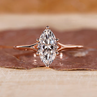 Rose gold engagement ring with marquise cut ring.
