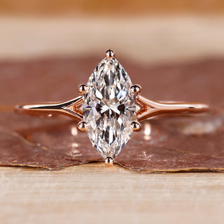 Rose gold engagement ring with marquise cut ring.