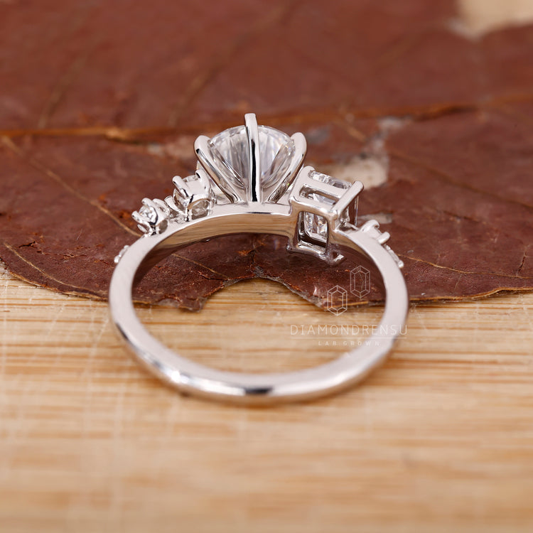 Lab grown cluster diamond engagement ring.