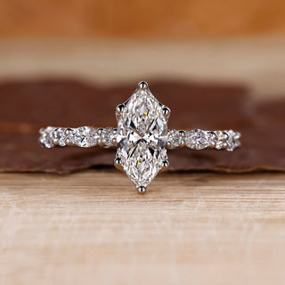Marquise cut engagement ring in white gold.