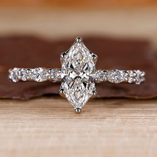 Marquise cut engagement ring in white gold.