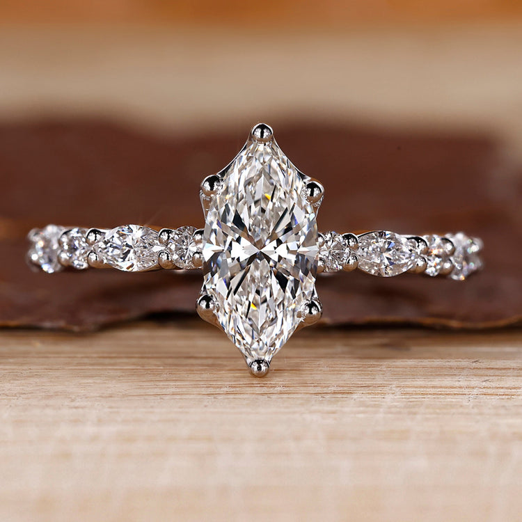 Marquise cut engagement ring in white gold.