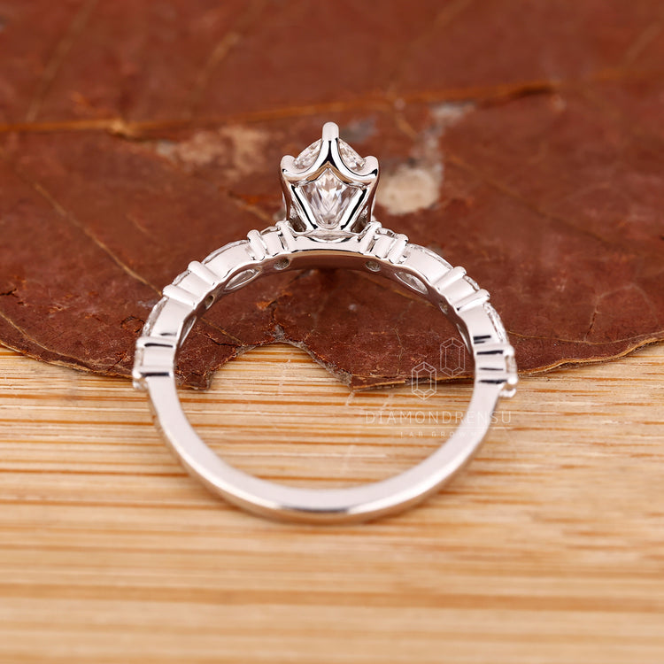Unique white gold marquise diamond ring.