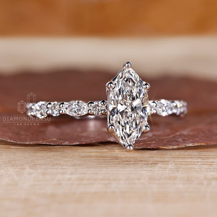 Pave setting marquise cut engagement ring.