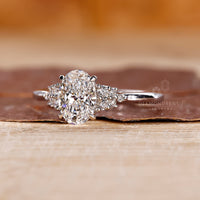 Muse setting holds Oval Cut Engagement Ring.