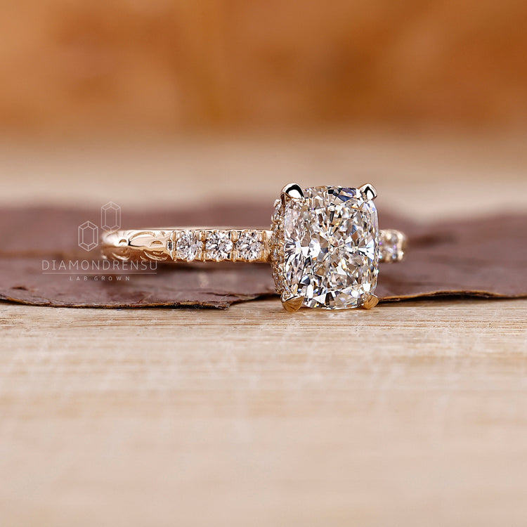 Yellow gold ring with cushion cut diamond ring.