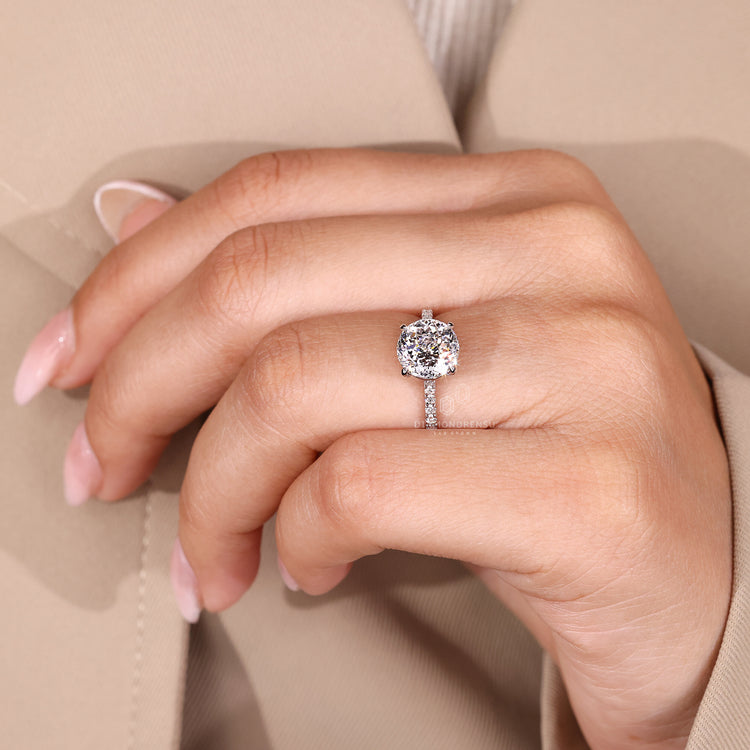 Portuguese cut ring pave round diamond cathedral.