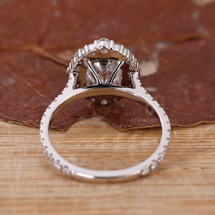 Handmade Cushion Old European Cut halo diamond ring.