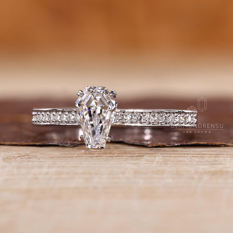 Coffin Cut Ring with a Cathedral Prong Setting that's sure to Delight.