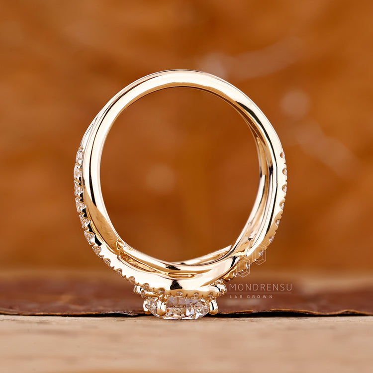 Round diamond ring twisted shank halo setting.