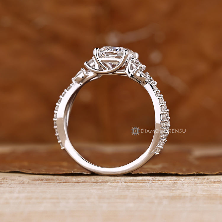 Handmade cushion cut diamond ring trellis setting.
