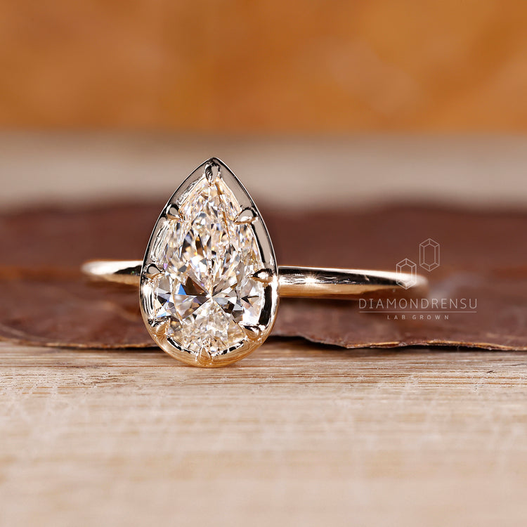 Vintage pear diamond ring solitaire eight claw prong.