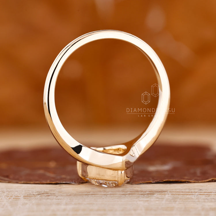 Pear diamond ring solitaire three claw prong set.