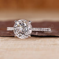 Lab grown Portuguese cut ring pave round diamond.
