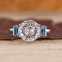 Portuguese cut diamond ring with emerald and sapphire.