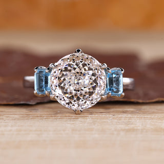 Portuguese cut diamond ring with emerald and sapphire.