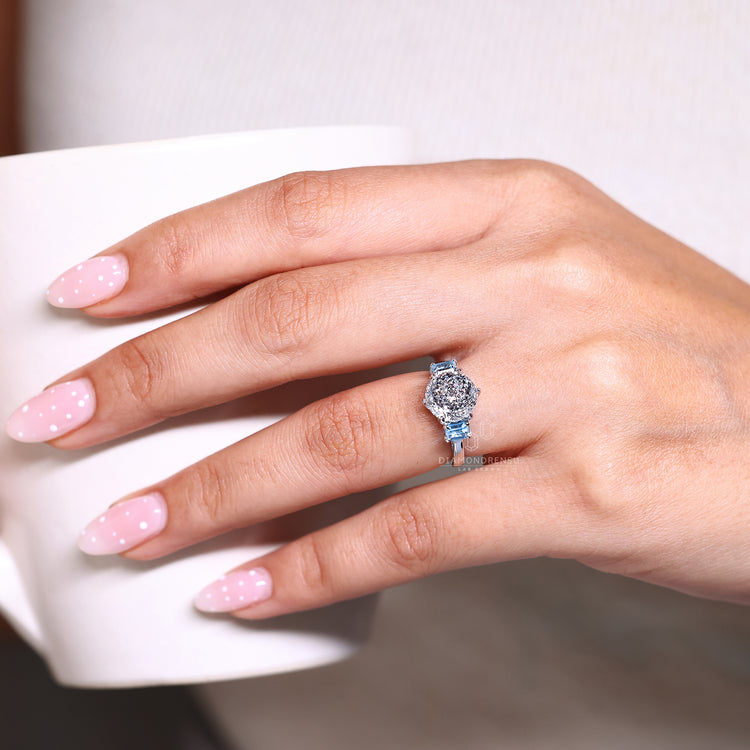 1 CT Portuguese cut lab diamond in cathedral setting.