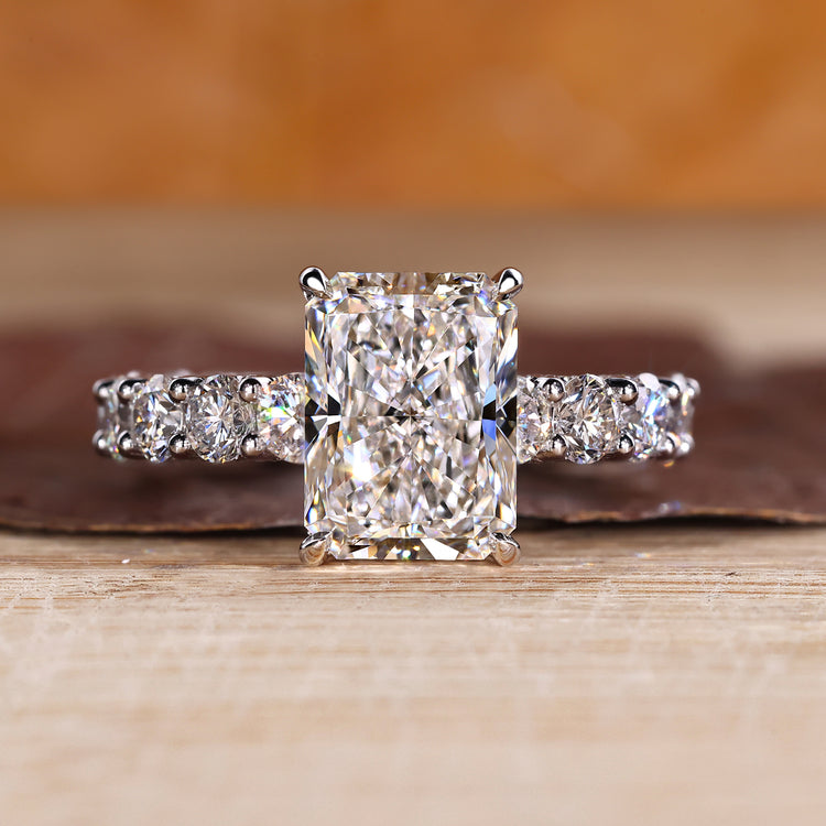 Radiant cut lab diamond ring in u prong micro pave.