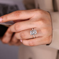Radiant cut ring with tapered shank design.