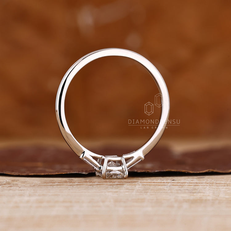 Radiant diamond ring tapered baguette cathedral set.