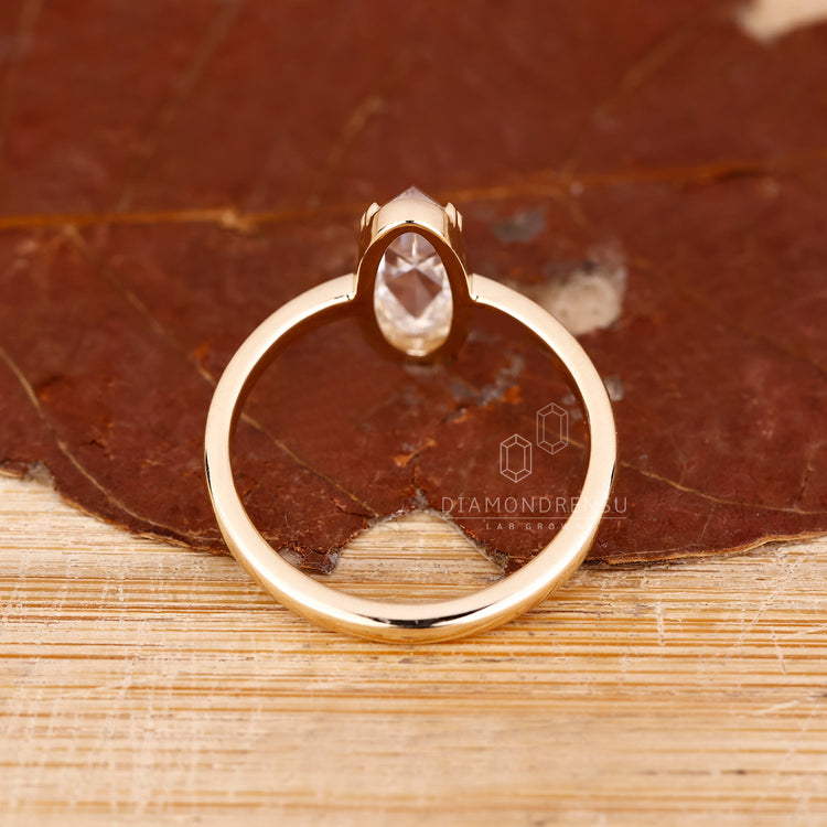 IGI certified moval rose diamond ring double claw set.