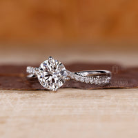 Lab grown round diamond ring twisted shank pave.