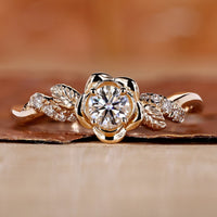 Round cut diamond ring flower inspired nature style.
