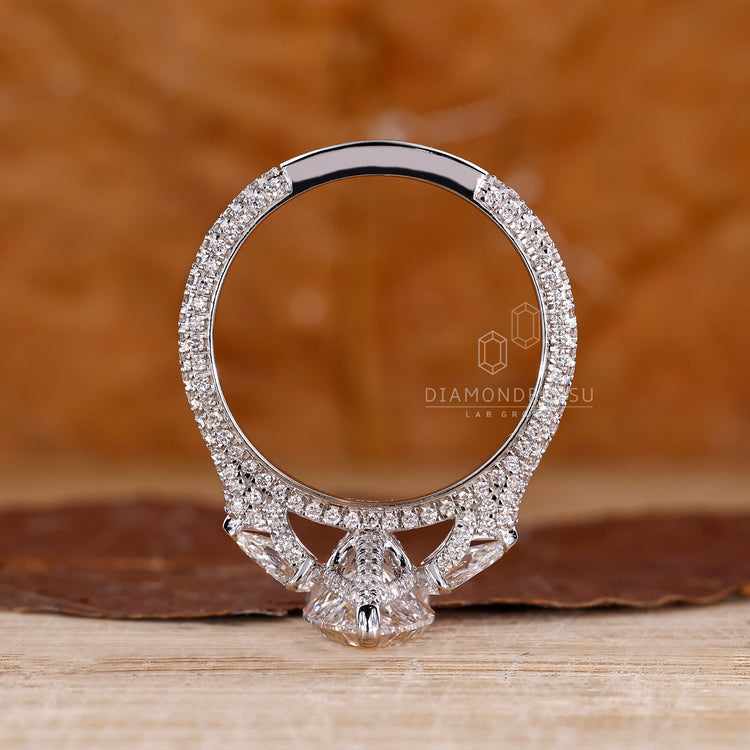 IGI certified handmade pear cut cathedral ring.